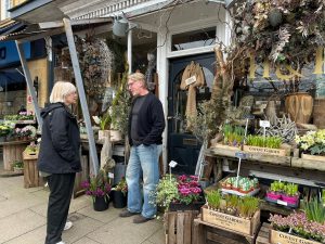 Claire Lasko with shopkeeper