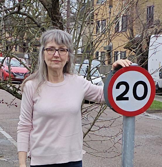 Kidlington East Green Councillor Fiona Mawson with 20mph sign - speed limit not being enforced